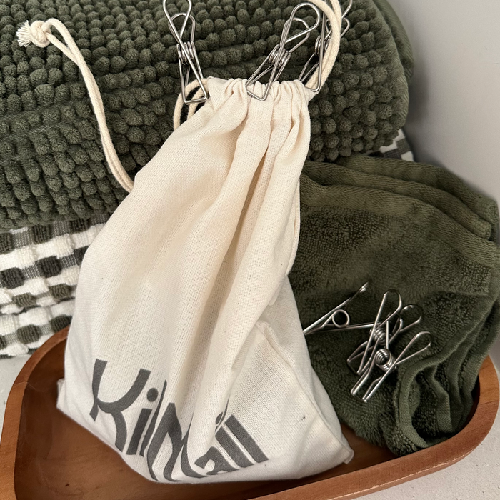 Stainless Steel Clothes Pegs pictured with Calico Clothes Peg Bag in laundry pictured on towels