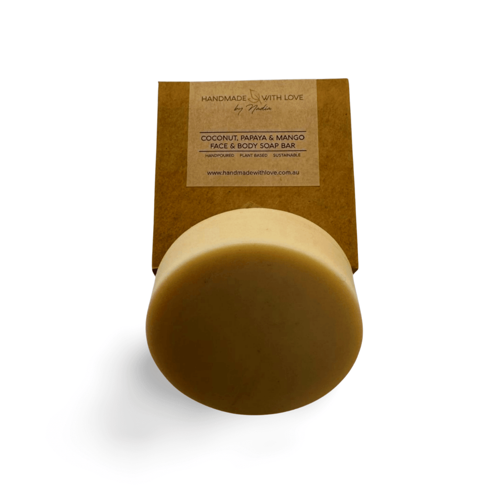 Coconut Papaya Mango Face & Body Bar, round pictured on brown packaging box