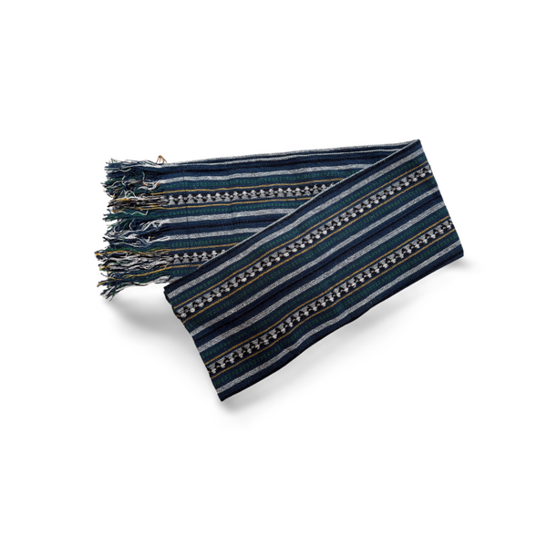 Handmade Cotton Scarf, made in Thailand folded on white background Blue and white tones