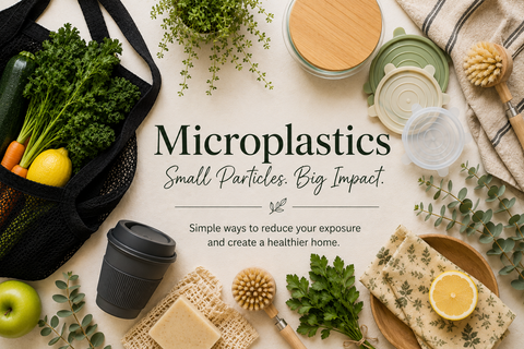 Image for Blog Post about Microplastics - flatlay of reusable and sustainable products like shopping bags, reusable coffee cup, handmade soap, reusable wax wraps, silicone food lids