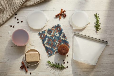 flat lay of Kitmaii Kitchen products on a cream coloured wooden bench