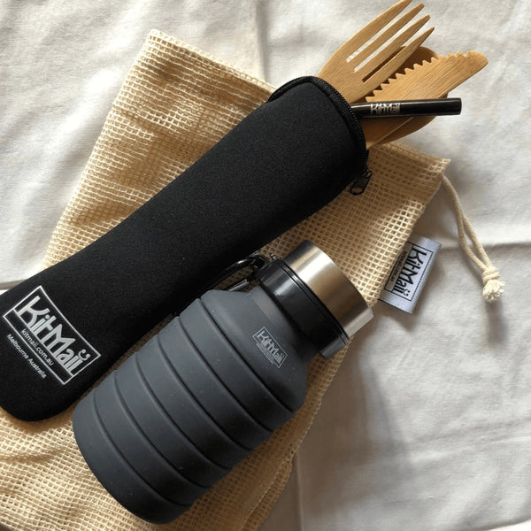 Reusable bamboo cutlery set, collapsible drink bottle and organic cotton produce bag sold in a bundle.