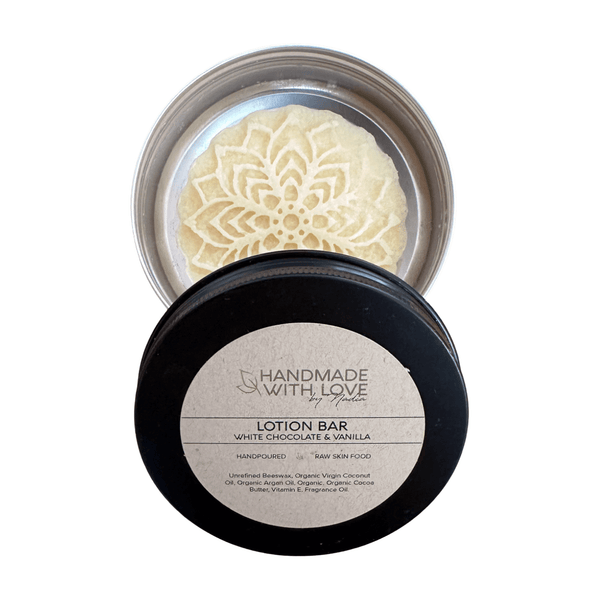 White Chocolate and Vanilla Lotion Bar in metal tin on a white background