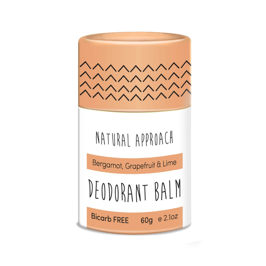 Deodorant balm container with peach-colored cap and label on a white background
