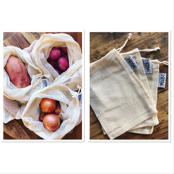 Image of 3 large produce bags filled with potatoes, sweet potatoes and onions next to 3 mini organic cotton produce bags on a wooden surface.